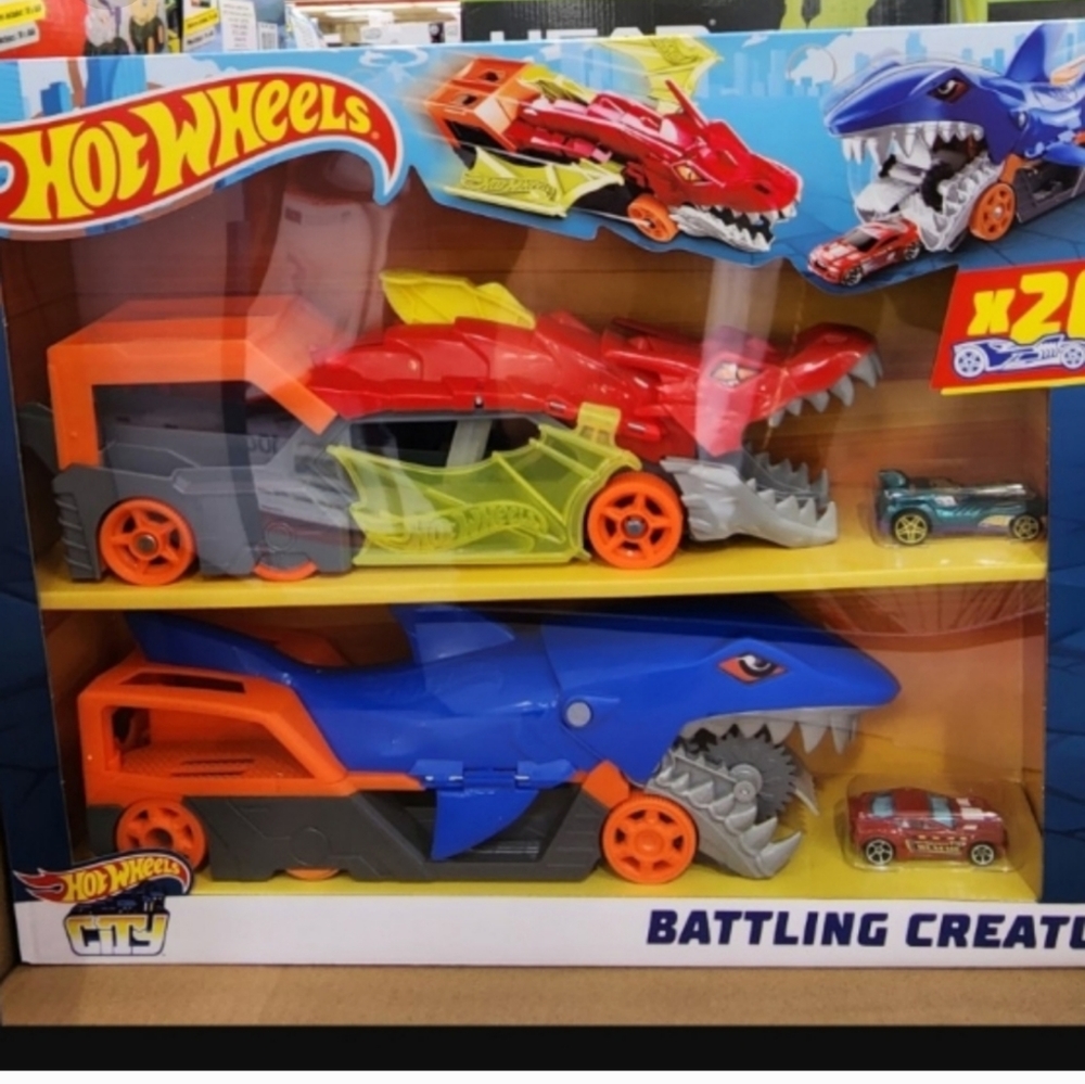 Hot Wheels City Battling Creature Transports with 20 Die-Cast Cars